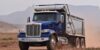 Dump-Truck-Loans-Dump-Truck-Financing-Blue-dump-truck-on-dirt-road