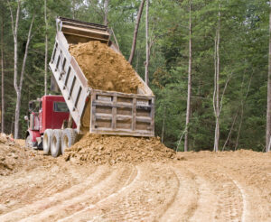 Dump Truck Unloading Dirt - Financing