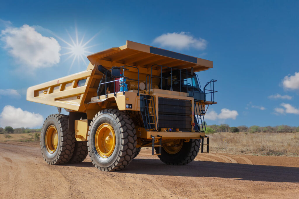 First Energy-Efficient Tyre - Michelin introduces the industry's first energy-efficient tyre - Dump truck on dirt road