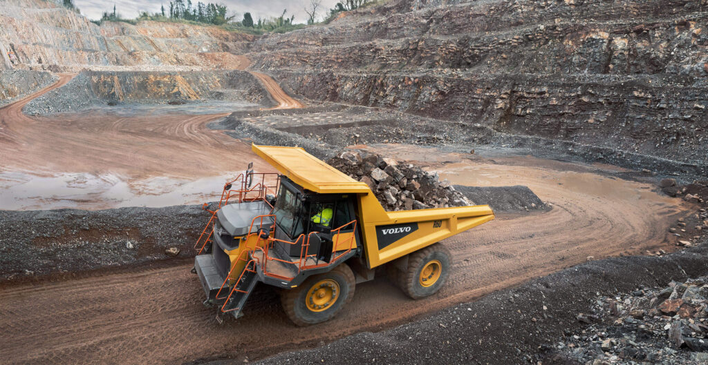 Volvo CE Adds New Dump Trucks to Lineup - R60 Dump Truck on dirt road