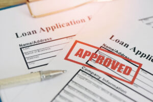 What Are Commercial Vehicle Loan Qualifications - Loan Applications with Approved stamp