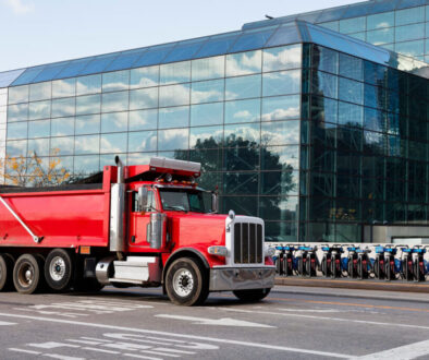 How to sell a dump truck, red Infront of bikes